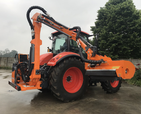 Spreading mulcher on tractor Spreading mulcher on tractor