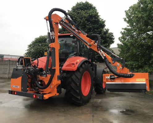 Spreading mulcher for tractor for road maintenance Spreading mulcher for tractor for road maintenance