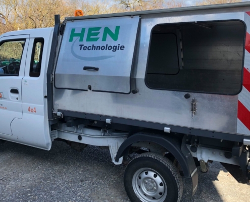 Picco truck with HEN garbage container
