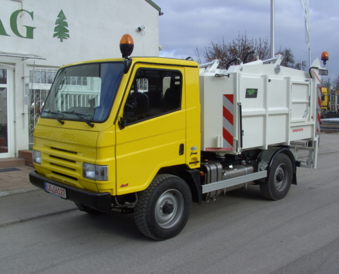 Bonetti with HEN garbage compactor attachment Bonetti with HEN garbage compactor attachment